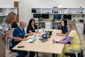 Clinical research staff working with a study participant