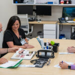 Clinical research staff working with a study participants