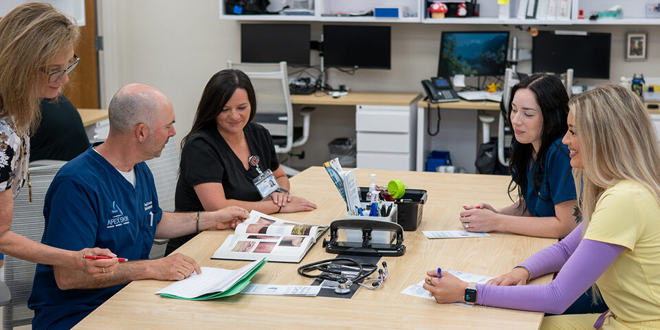 Clinical research staff working with a study participants