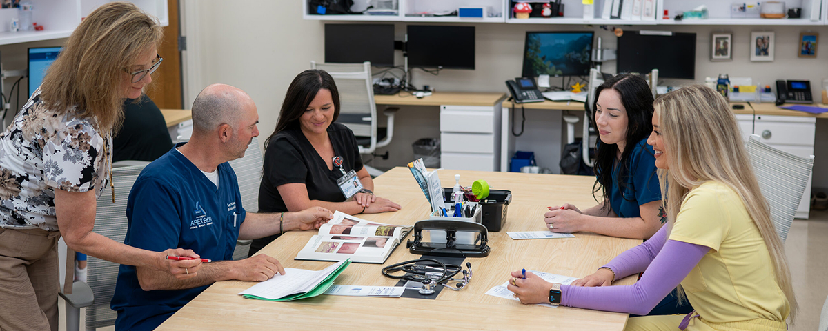 Clinical research staff working with a study participants